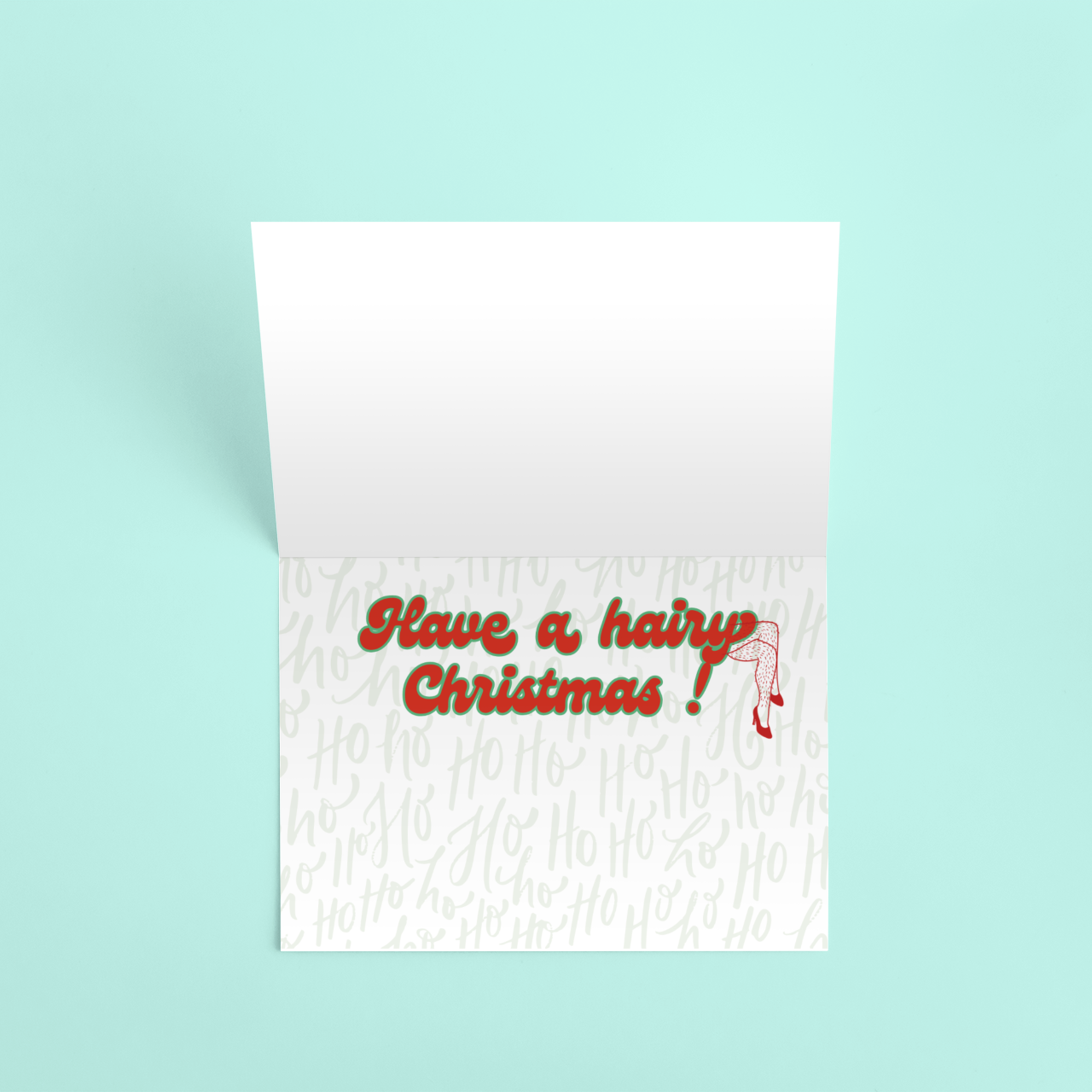 Card with 'Have a hairy Christmas!' text on a light blue background