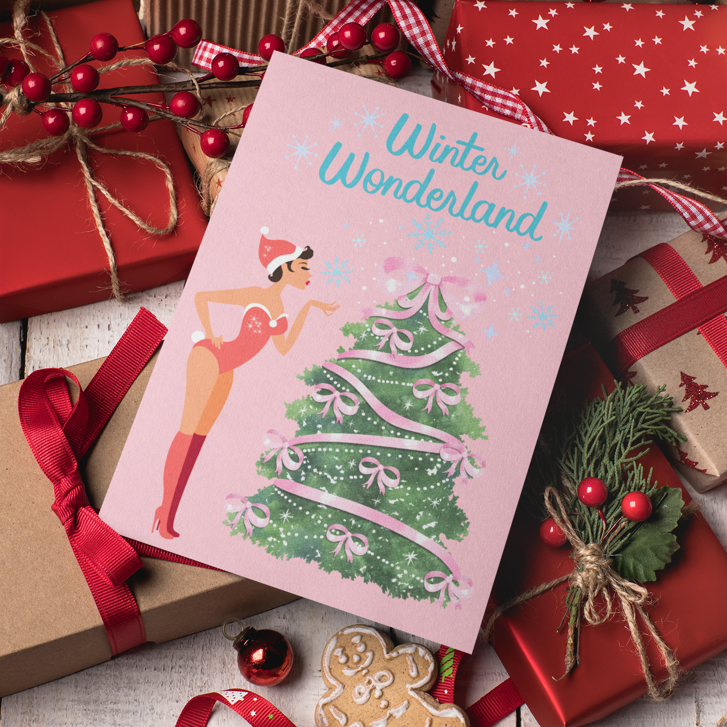 Christmas card with 'Winter Wonderland' text and Christmas tree design, surrounded by gift boxes and festive decorations.
